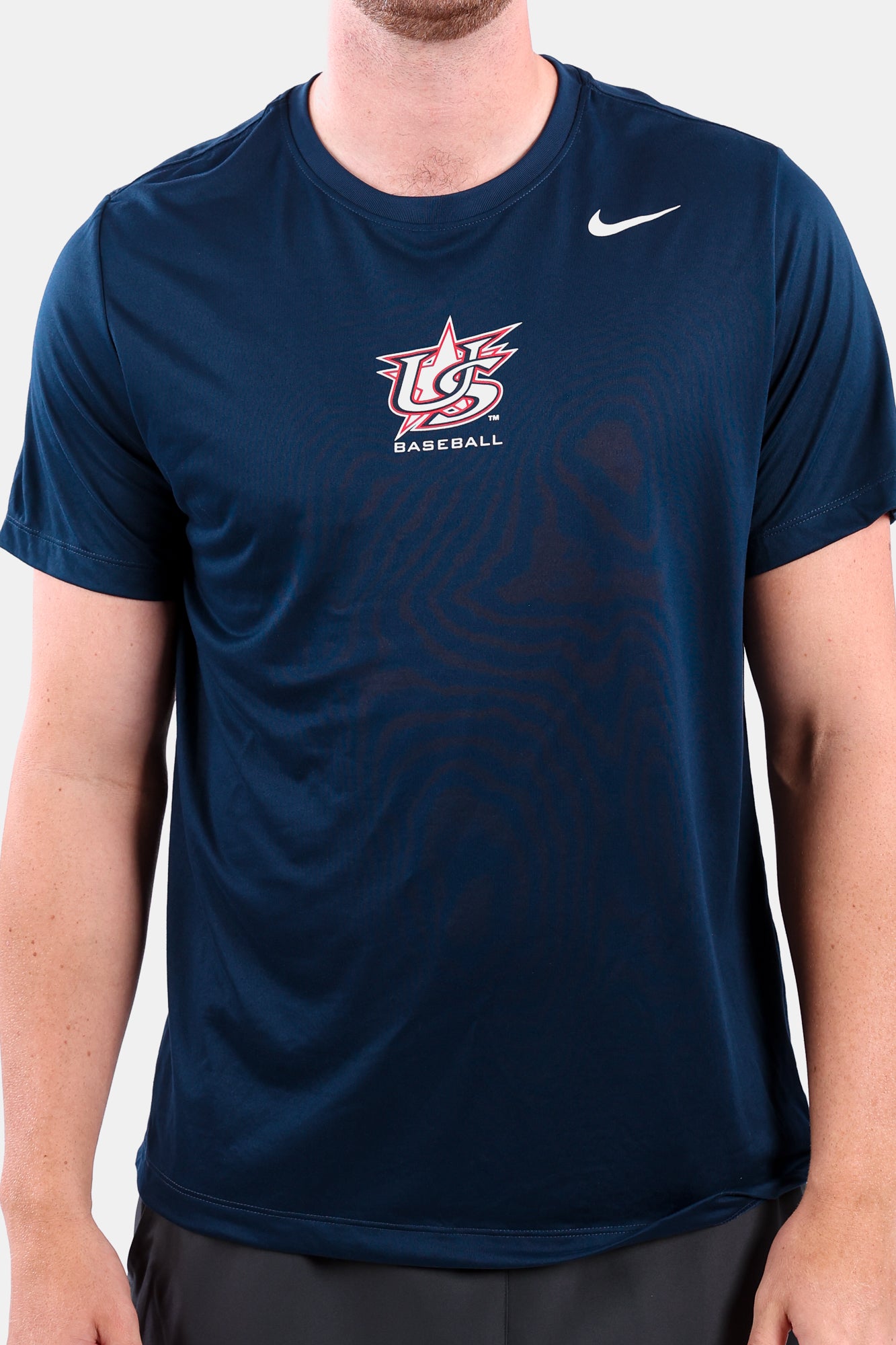 Detail shot of male model wearing Navy Legend Tee