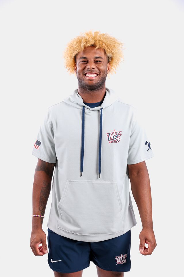 Male model wearing the USA x Baseballism Grey Short Sleeve Hoodie featuring the USA Baseball Star logo